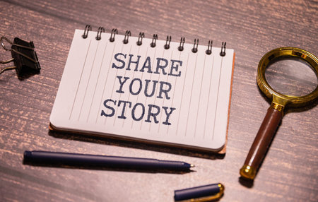 Share your experience Quote text on paper card top view on pink background, Motivation and inspirational conceptの写真素材