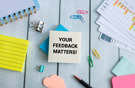 Text your Feedback matters on White Paper Background, Business concept.