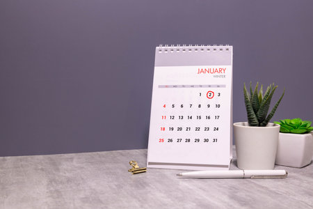 January 2nd. Day 2 of January month, calendar on yellow background. Winter time. Empty space for textの写真素材