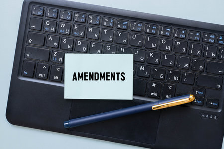 AMENDMENT - word on brown paper with marker on green background. Info conceptの写真素材