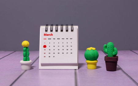 Wooden calendar March 08 on a white background close up.の写真素材