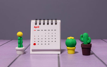 April 26 - from wooden blocks with letters, important date concept, white background random letters...