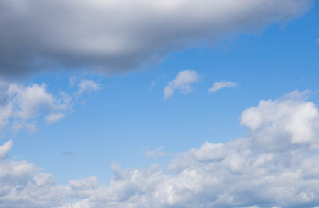 blue sky with white clouds. The sky is clear and bright.