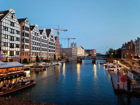 Gdansk,Poland:22/06/2024:View of the buildings and the Motlawa River in Gdansk.