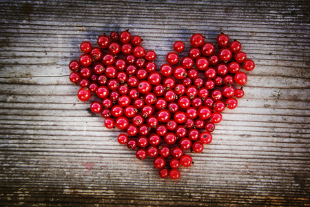 Heart shape from redcurrant. Love theme concept for Valentine's background and love theme.の写真素材