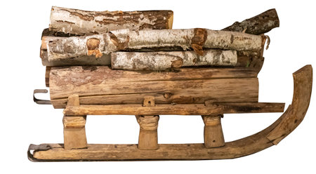 Real Antique Vintage Sled With Firewood. Isolated on White Background. Retro Style.