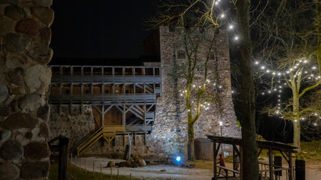 Ruins of Sigulda Medieval Castle, Latvia. Old Fortress Cristmas Time Night Shot.のeditorial素材