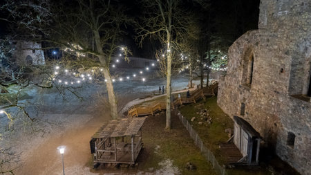 Ruins of Sigulda Medieval Castle, Latvia. Old Fortress Cristmas Time Night Shot.のeditorial素材