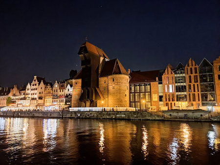 GdaÅ„sk Old Town - the Historical Port Crane Gate and Houses on the MotÅ‚awa River in the...