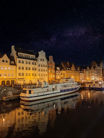 GdaÅ„sk Old Town - the Historical Port Crane Gate and Houses on the MotÅ‚awa River in the...
