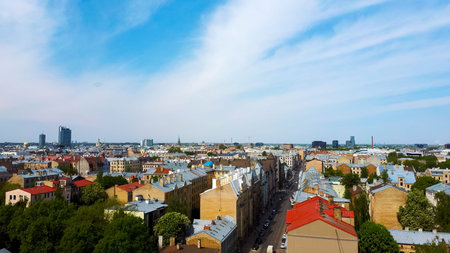 Riga Cityscape Spring Aerial Top View Video, Town, Latvia. Sunny Day Building Rooftops. Riga Skyline, Latvia, City Center, Teika, Purvciems in the Background. Architecture of the Downtown.の写真素材