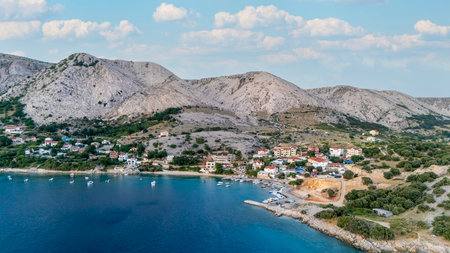 Campsite at Campig Skrila, Krk Island, Stara Baska Croatia, Aerial View of the Mountains and Coast With Boats, Beaches and Adriatic Sea. The Seaside Rv Campmobiles on a Summer Beautiful Coastlineの写真素材
