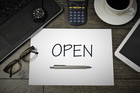 An image of writing desk, with a sheet of paperの写真素材