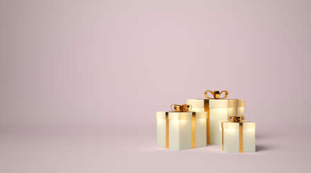 Luminous white gift boxes with gold ribbon on pink backgroundの写真素材