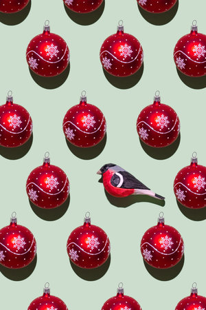 Pattern of red christmas balls with bullfinch.の写真素材