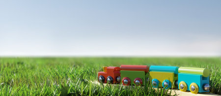 3d render of colorful train toy on green grassの写真素材