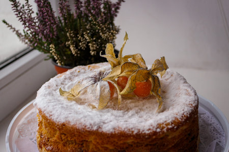 Incredibly Delicious Home Baked Cake. The Top Is Decorated With Edible Physalis Fruits.