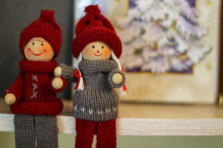 Christmas Time. Two Christmas Decorations In The Form Of A Boy And A Girl.の写真素材