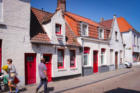 Bruges, Belgium - May 12, 2018: Tourists And Locals Walk On A Sunny Dayのeditorial素材