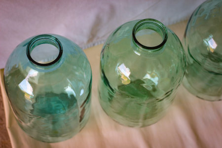 Huge glass jars on a light background