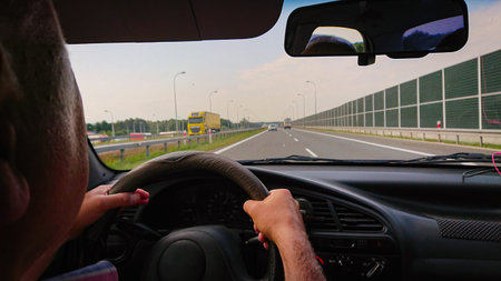 View of the highway and the bridge from the driver's seat