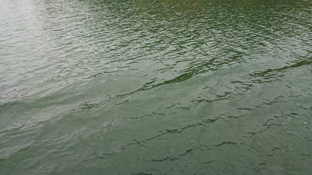 Looking at the surface of a large and beautiful mountain lake