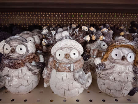 Many figures of Owls in strange hatsの写真素材