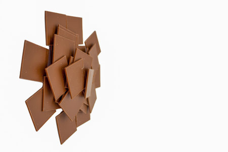 Few bars of milk chocolate on white backgroundの写真素材