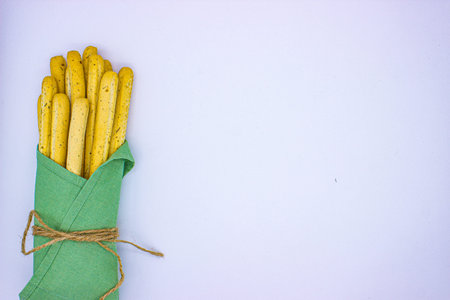 Italian breadsticks grissini on light backgroundの写真素材