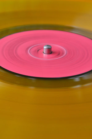 old yellow orange colored vinyl record. background