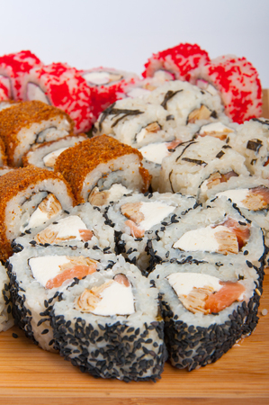 sushi rolls assorted on a wooden Board concept: deliveryの写真素材