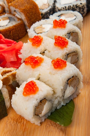 sushi rolls assorted on a wooden Board concept: deliveryの写真素材