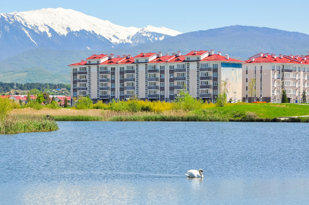 house on a background of mountains in the Adler district of Sochiの写真素材