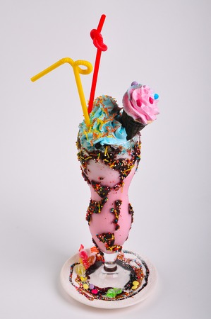 Mixed ice cream in sundae cup on white backgroundの写真素材