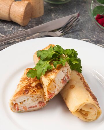 toasted pancake with tomatoes and cheeseの写真素材