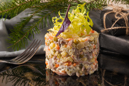 Russian salad on a black background. Close upの写真素材