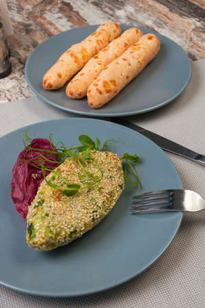 tasty vegetable cutlet with sesame and cheese bread sticks. Healthy foodの写真素材