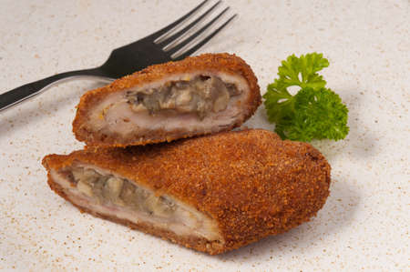 tasty meat zrazy with mushrooms decorated with greens. close upの写真素材