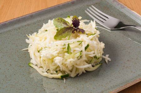 tasty salad with cabbage and cucumber. vegetarian food. close upの写真素材