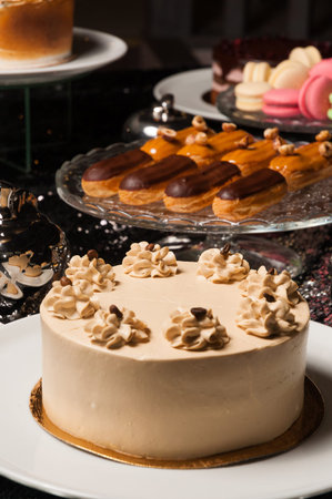 sweet cake close-up, custard cakes and macaroni. Concept handmade confectionery products