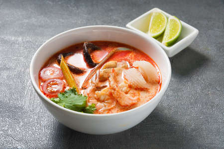 tasty traditional thai tom yam soup with seafoodの写真素材