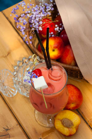 tasty cocktail based on peach, cream with honey and marshmallowsの写真素材