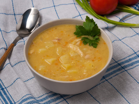 tasty mashed pea soup with chicken and vegetablesの写真素材