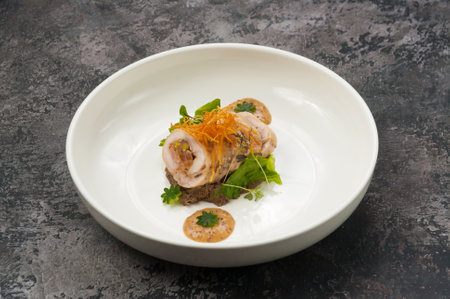 tasty chicken roll stuffed with vegetables in a restaurantの写真素材