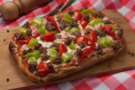 tasty pizza with minced meat and bell pepperの写真素材
