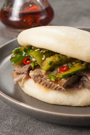 tasty bao bun with beef and broken cucumbersの写真素材