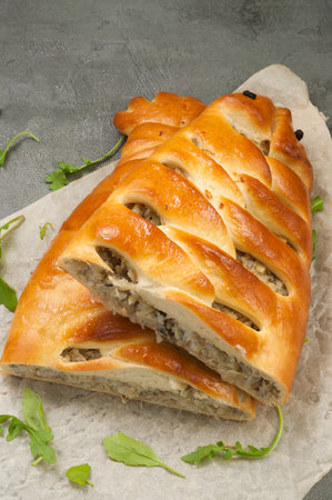 tasty fish and onion pie in the shape of a fishの写真素材