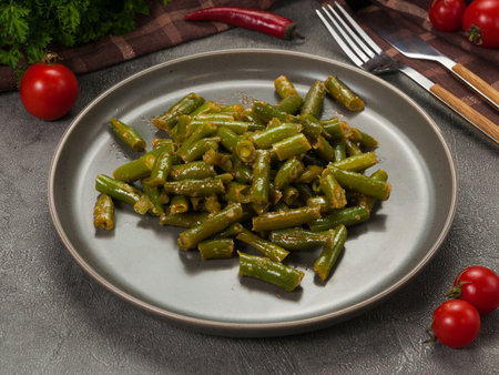 tasty boiled string beans on a gray plate. vegetarian dishの写真素材