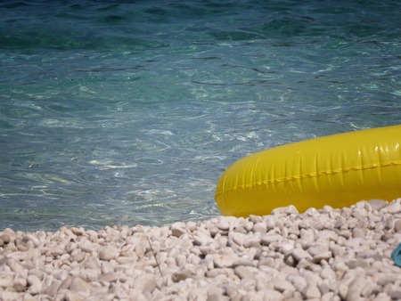 a detail of some toy on the seaの写真素材