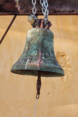a detail of a greek bell